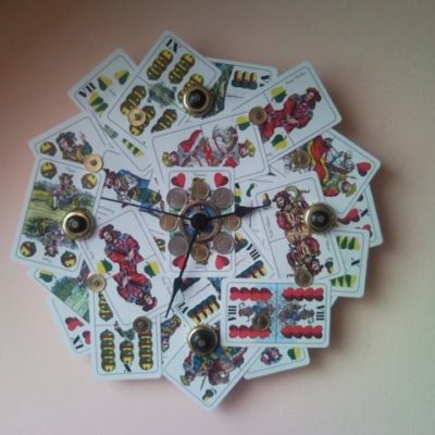 Colourful upcycled wall clock from playing card