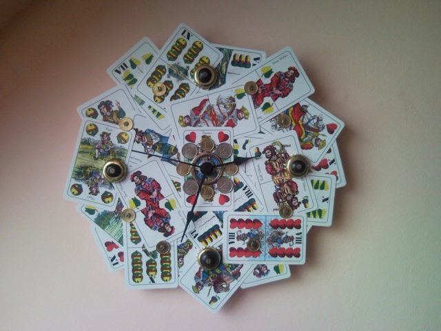 Colourful upcycled wall clock from playing card