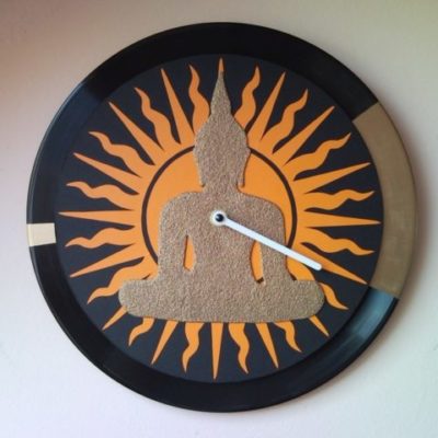 Gold Buddha wall clock from vinyl LP with sun motive