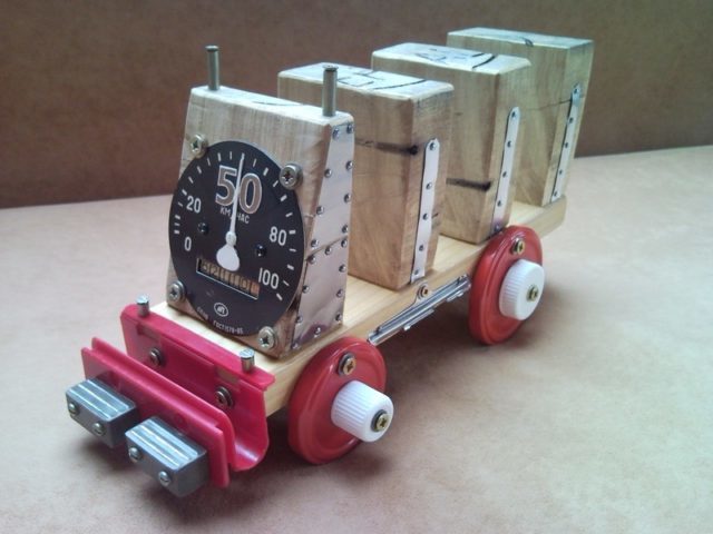 Recycled envelope and key holder transporter truck from pallet