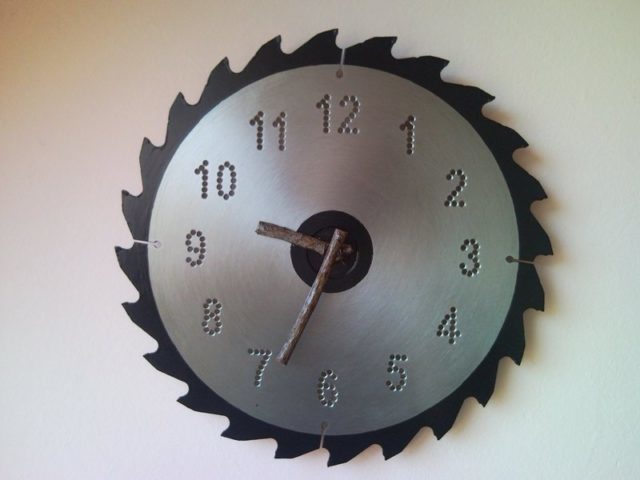 Recycled circular saw wall clock with bough clock hands