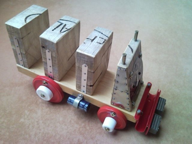 Recycled envelope and key holder transporter truck from pallet