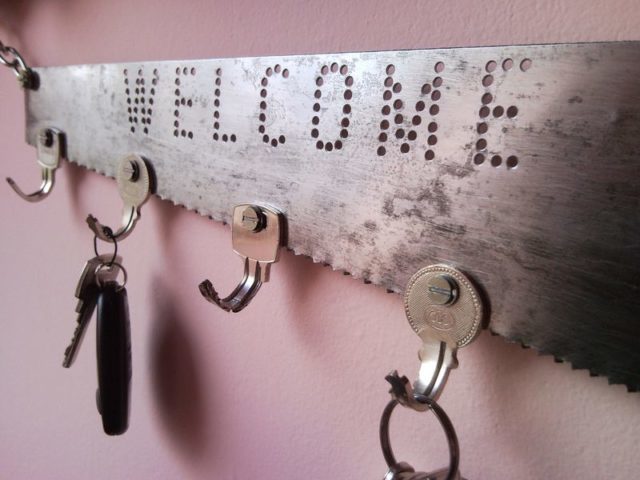 Upcycled Welcome Home key holder organizer from pad saw