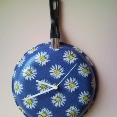 Upcycled wall clock from griddle, frying pan with decoupaged flowers 2.