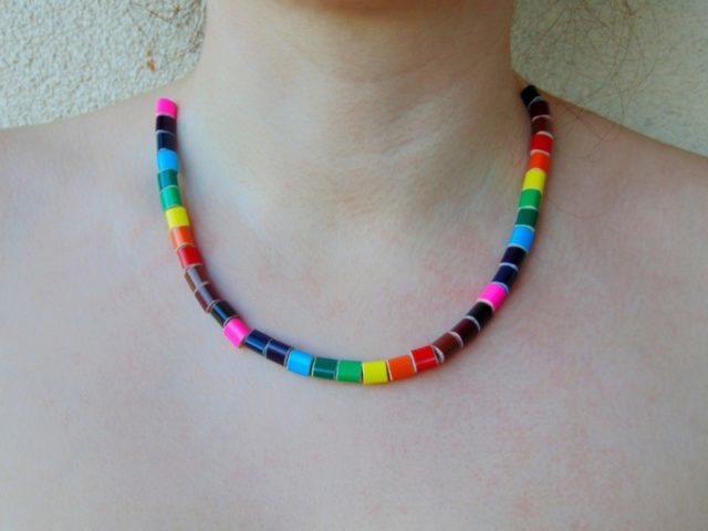 Rainbow colored pencil crayon necklace on fishing line 1