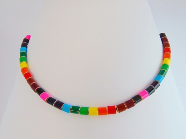 Rainbow colored pencil crayon necklace on transparent elastic fishing line 1